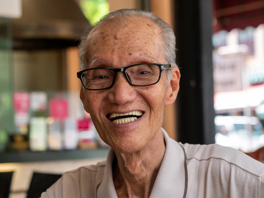 An older man smiling
